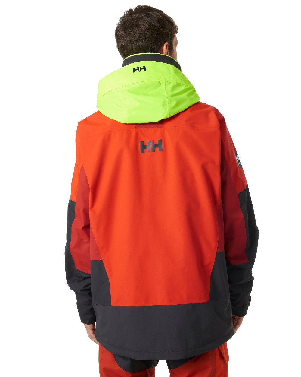 Patrol Orange coloured Helly Hansen Mens Newport Coastal Jacket on white background 