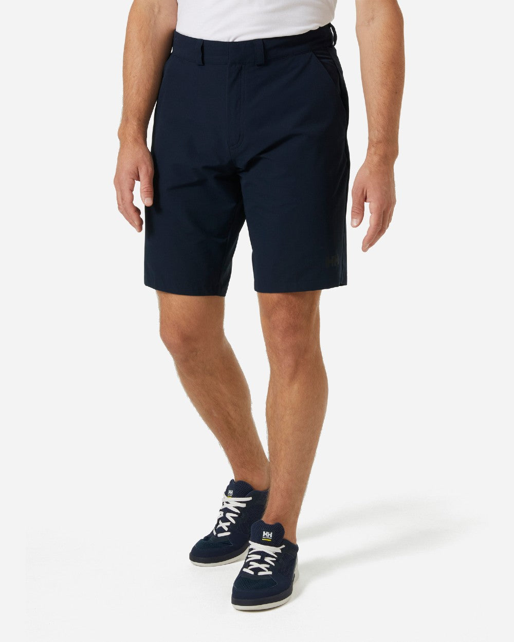 Navy coloured Helly Hansen Mens Quick Dry Shorts on grey background 