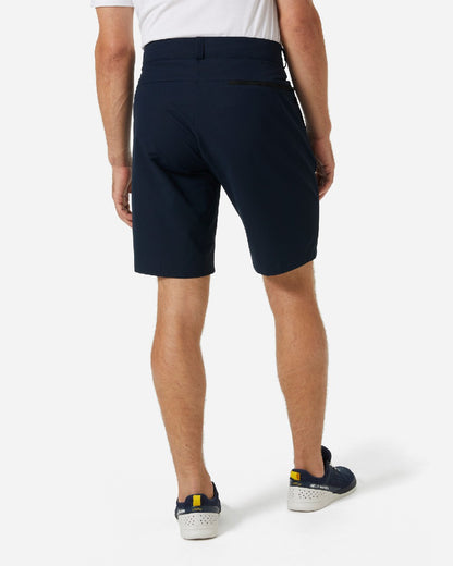 Navy coloured Helly Hansen Mens Quick Dry Shorts on grey background 