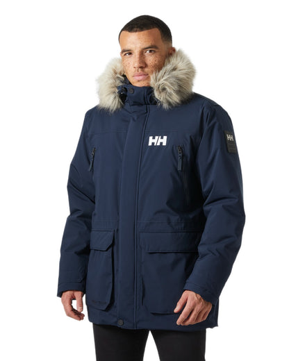 Navy Coloured Helly Hansen Mens Reine Winter Parka on White Background
