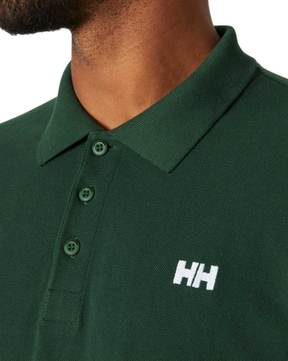 Jungle Green Coloured Helly Hansen Mens Transat Polo Shirt on White Background
