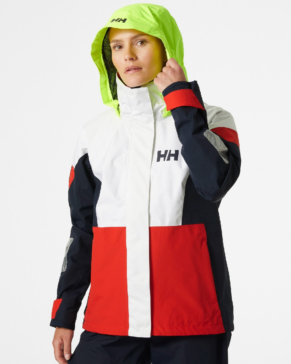 Alert Red coloured Helly Hansen Womens Newport Coastal Jacket on grey background 