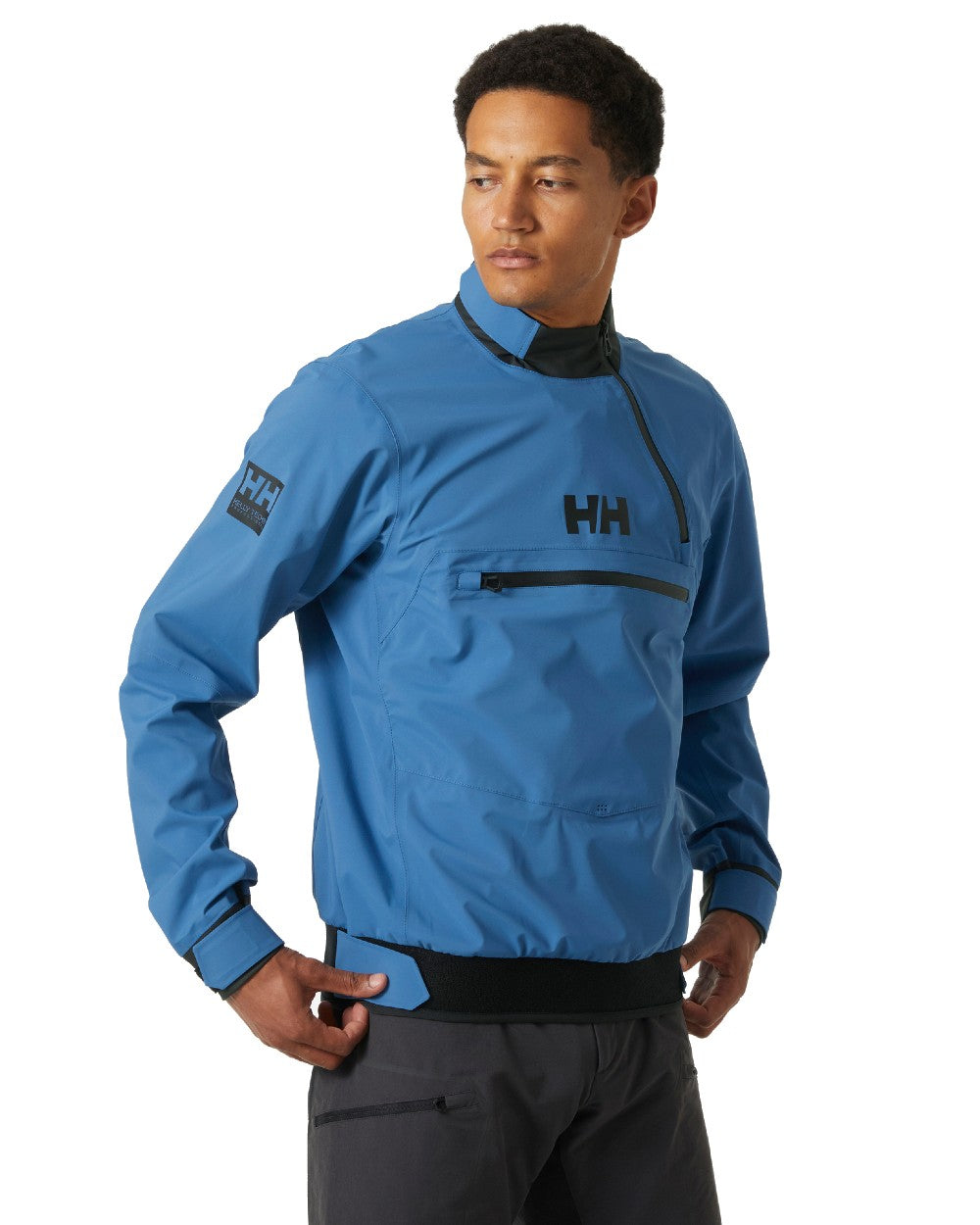 Azurite coloured Helly Hansen Unisex Foil Shell Smock on white background 