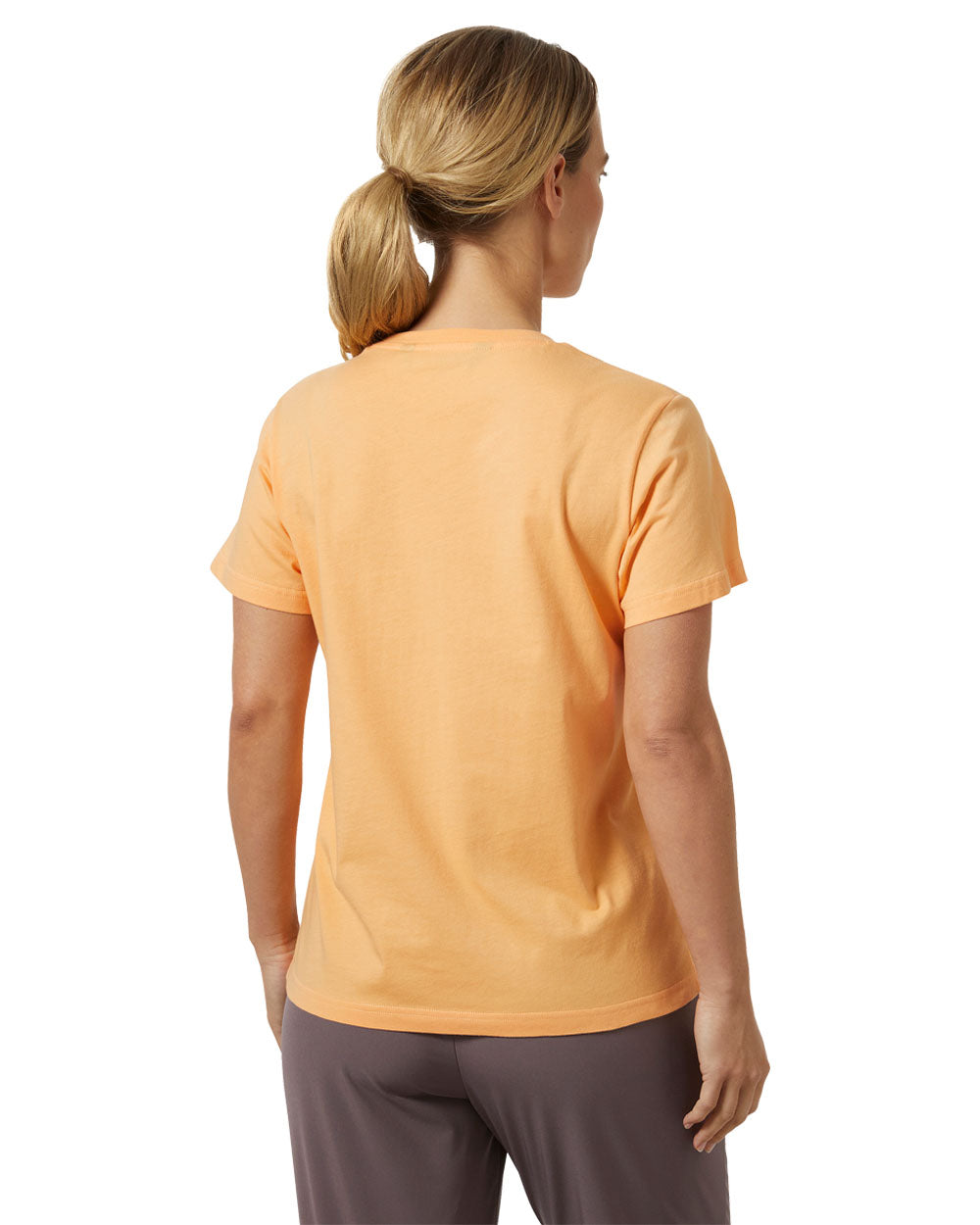 Miami Peach coloured Helly Hansen Womens T-Shirt on white background 