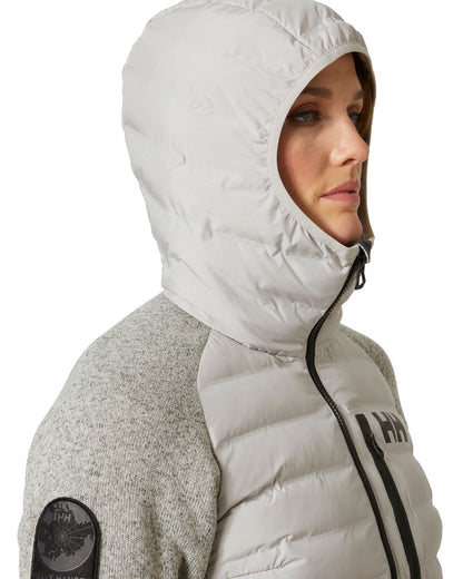 Mellow Grey coloured Helly Hansen Womens Arctic Ocean Hybrid Insulator Jacket on white background 