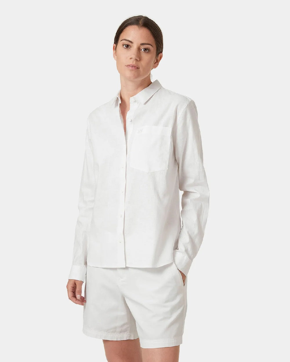 White coloured Helly Hansen Womens Club Shirt on grey background 