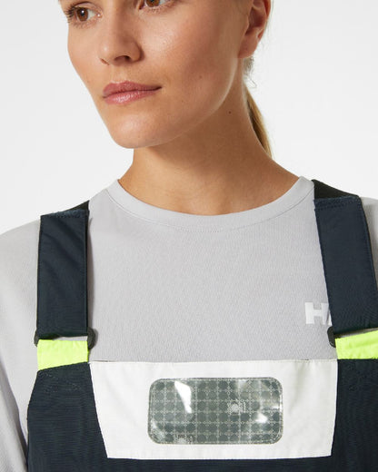 Navy coloured Helly Hansen Womens Newport Coastal Sailing Bib on grey background 