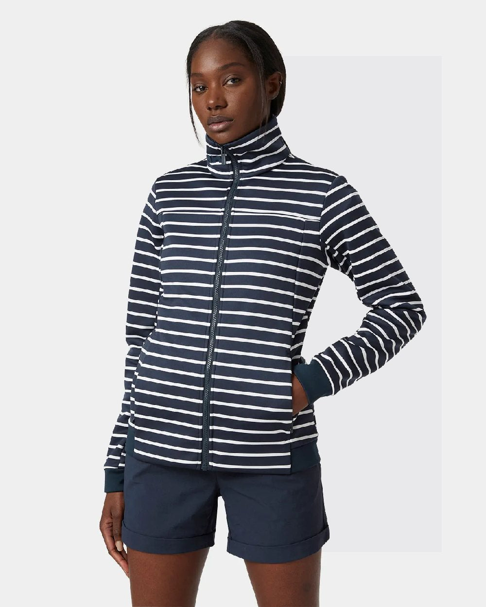 Navy Stripe coloured Helly Hansen Womens Crew Fleece Jacket on grey background 