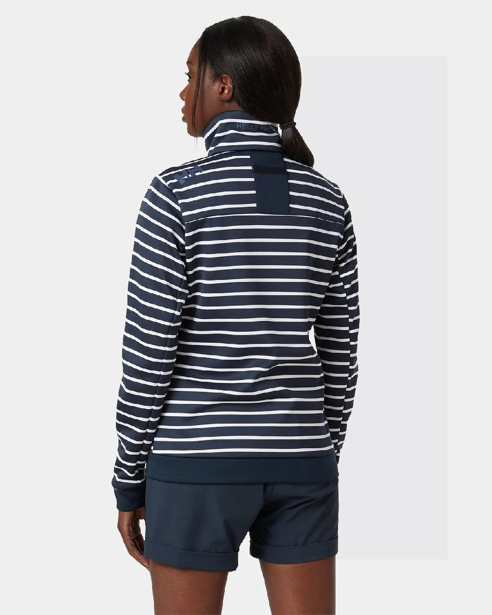 Navy Stripe coloured Helly Hansen Womens Crew Fleece Jacket on grey background 