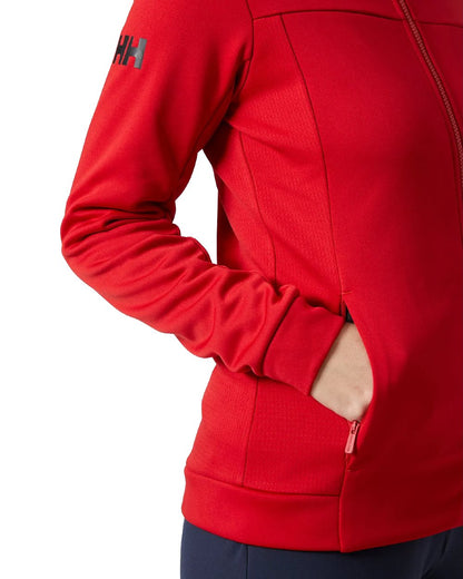 Red coloured Helly Hansen Womens Crew Fleece Jacket on white background 