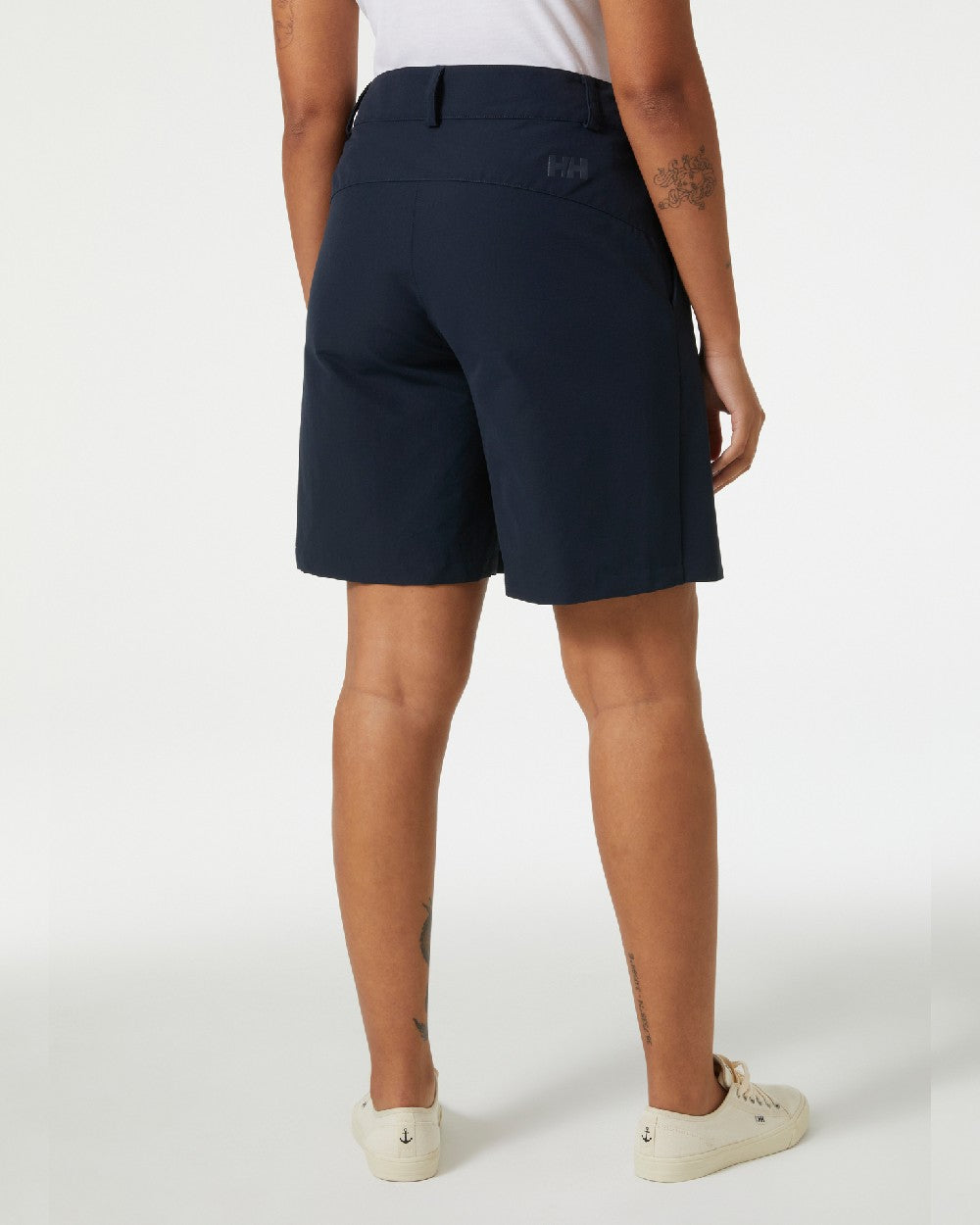 Navy coloured Helly Hansen Womens Crew Sailing Skort on grey background 