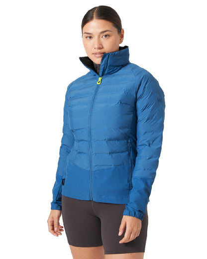 Azurite coloured Helly Hansen Womens HP Hybrid Insulator Jacket 2.0 on white background 