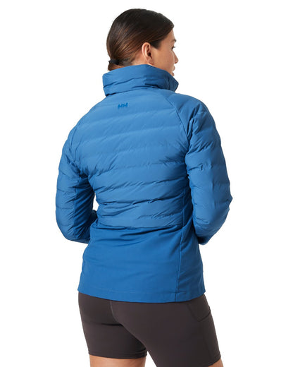 Azurite coloured Helly Hansen Womens HP Hybrid Insulator Jacket 2.0 on white background 