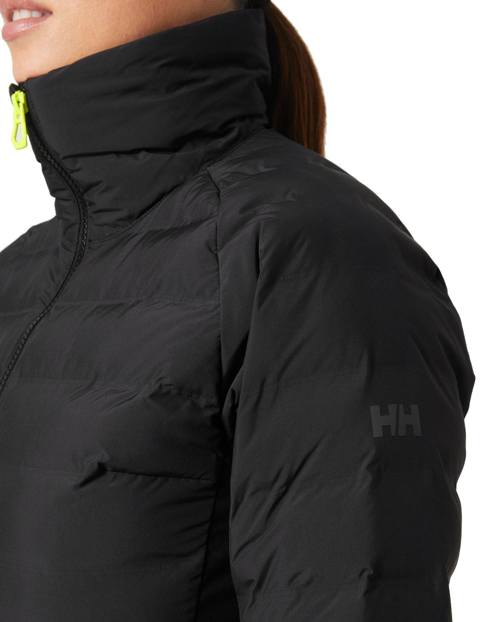 Black coloured Helly Hansen Womens HP Hybrid Insulator Jacket 2.0 on white background 