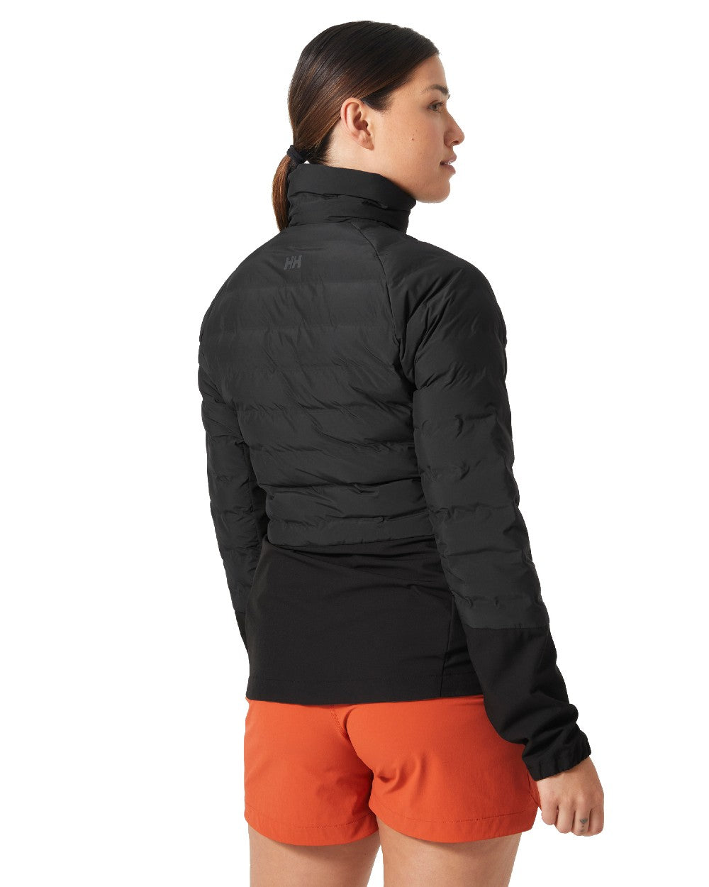 Black coloured Helly Hansen Womens HP Hybrid Insulator Jacket 2.0 on white background 