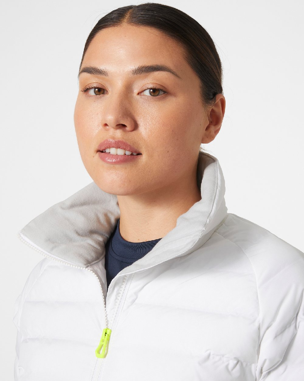 White coloured Helly Hansen Womens HP Hybrid Insulator Jacket 2.0 on grey background 