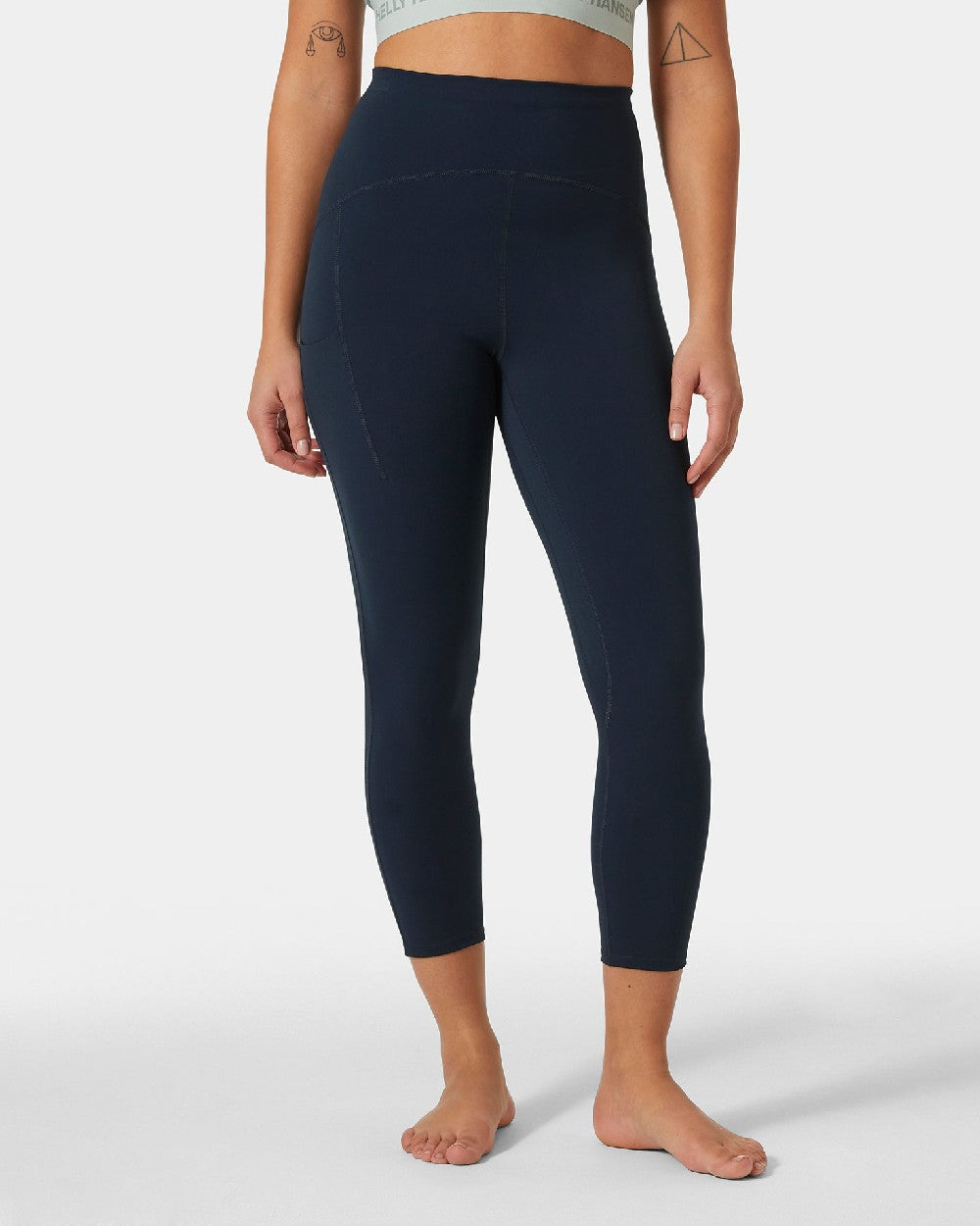 Navy coloured Helly Hansen Womens HP Leggings on grey background 