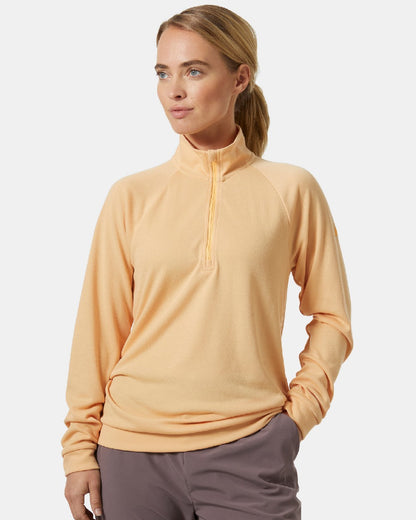 Miami Peach coloured Helly Hansen Womens Inshore Half Zip Pullover on grey background 