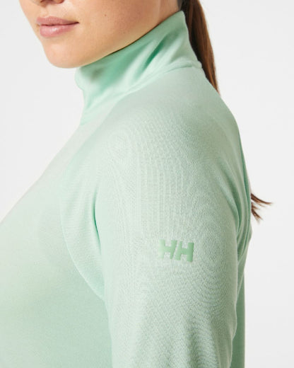 Mint coloured Helly Hansen Womens Inshore Half Zip Pullover on grey background 