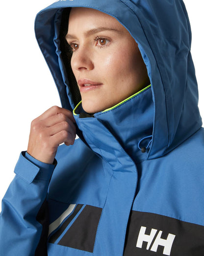 Azurite coloured Helly Hansen Womens Newport Inshore Sailing Jacket on white background 