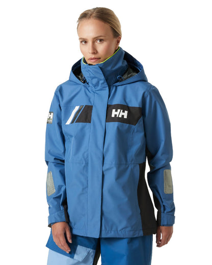 Azurite coloured Helly Hansen Womens Newport Inshore Sailing Jacket on white background 