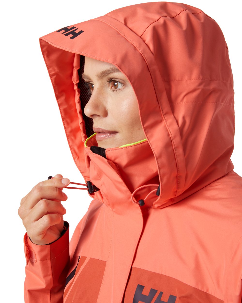 Peach Echo coloured Helly Hansen Womens Newport Inshore Sailing Jacket on white background 