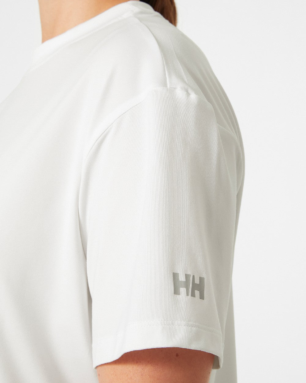 White coloured Helly Hansen Womens Ocean Cropped T-Shirt on grey background 