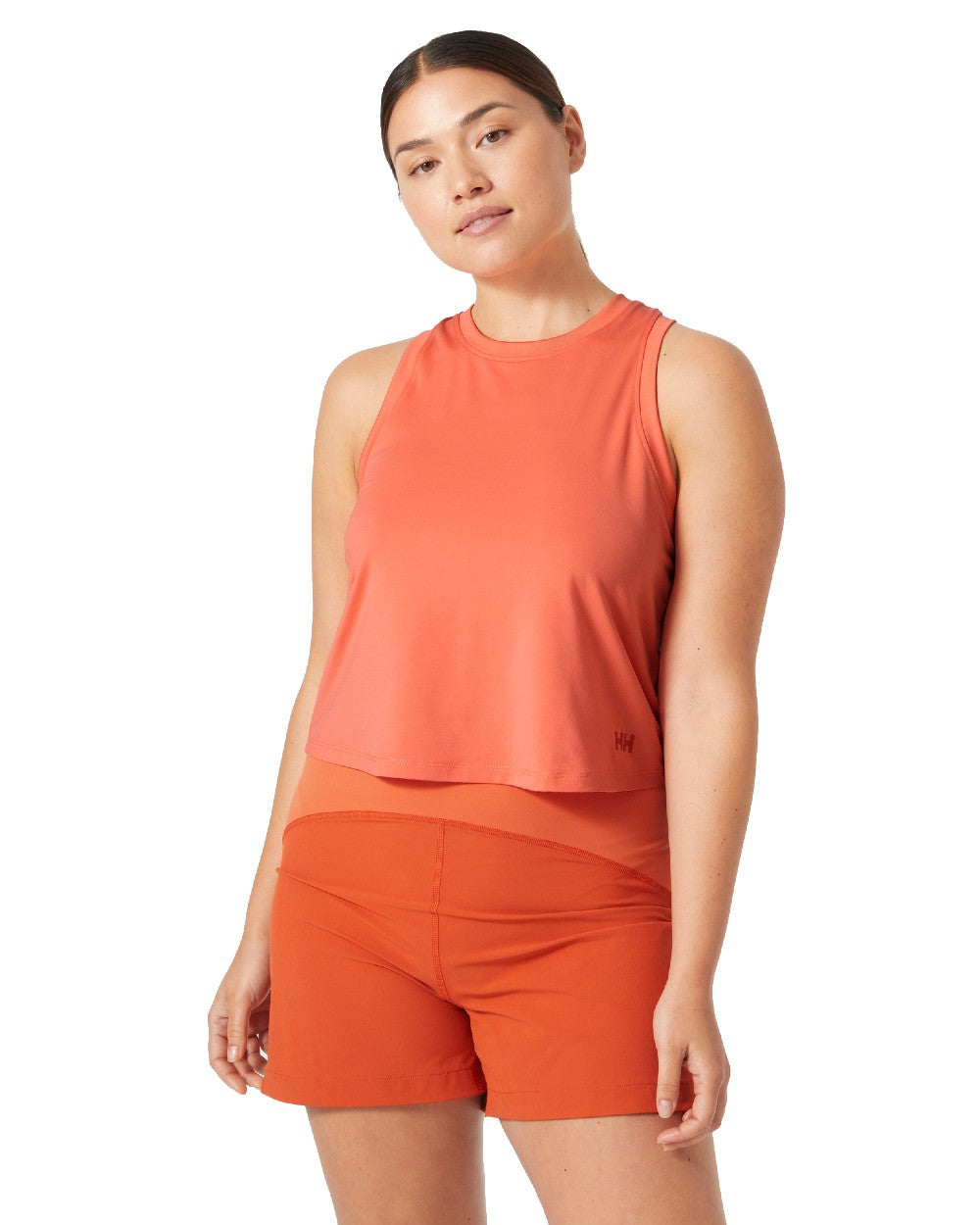 Peach Echo coloured Helly Hansen Womens Ocean Cropped Tank Top on white background 