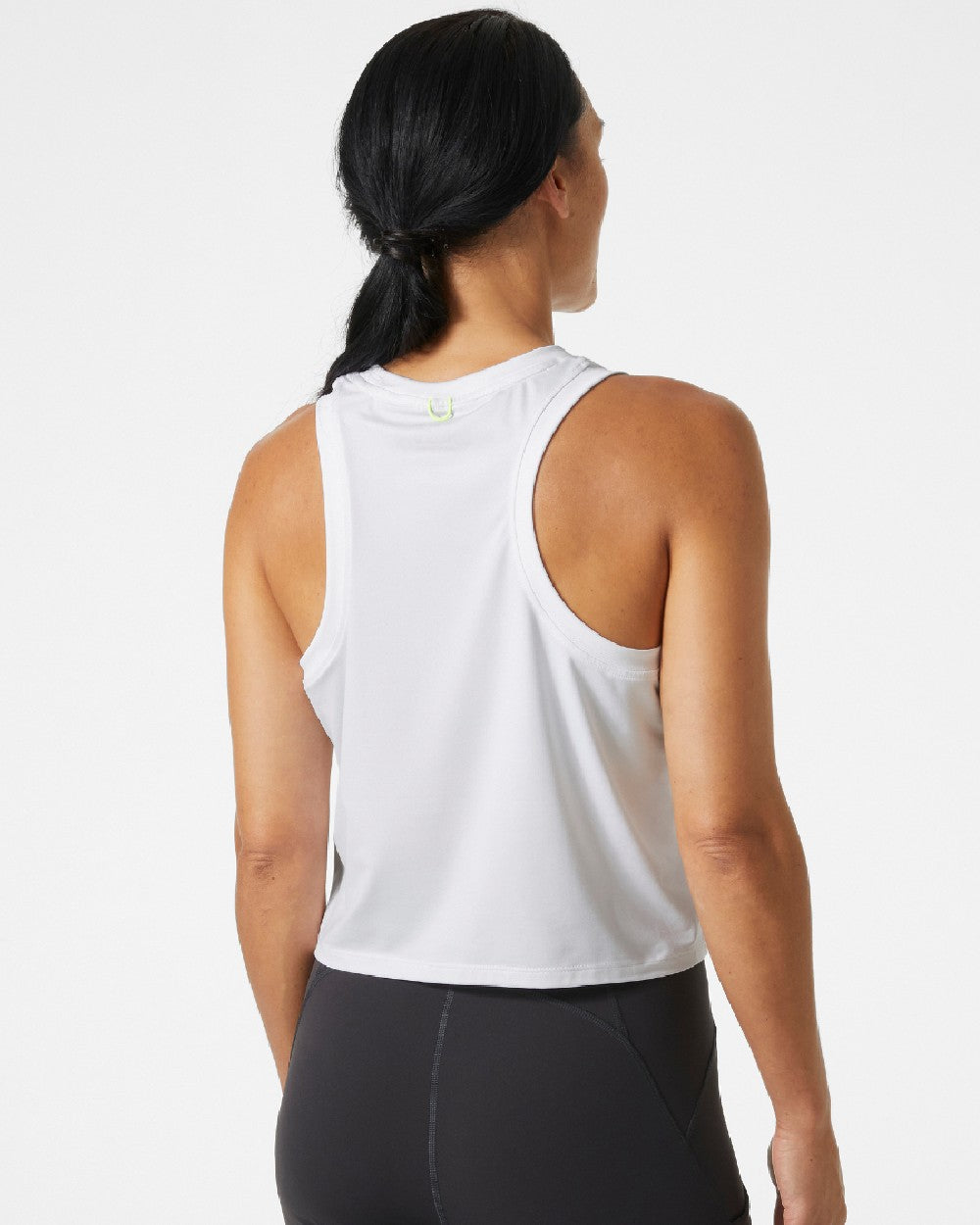 White coloured Helly Hansen Womens Ocean Cropped Tank Top on grey background 