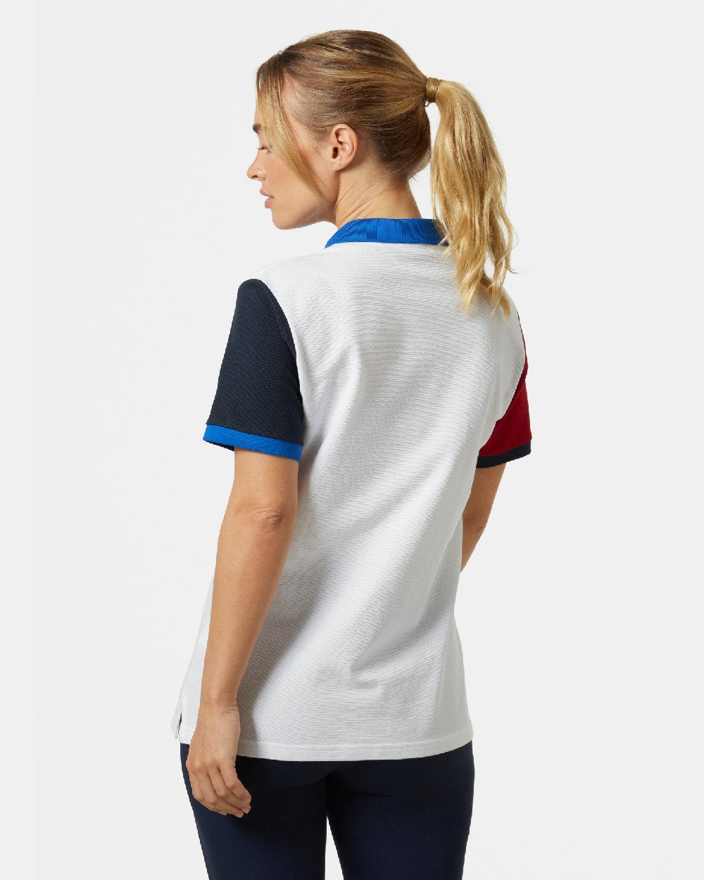 White coloured Helly Hansen Womens Pier Pique Polo Shirt on grey background 