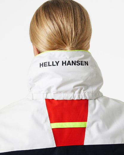Alert Red coloured Helly Hansen Womens Newport Regatta Sailing Jacket on grey background 