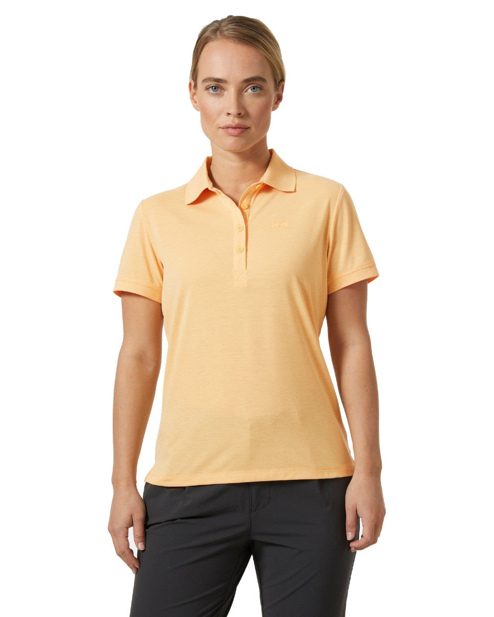 Miami Peach coloured Helly Hansen Womens Siren Quick Dry Polo T-shirt on white background 