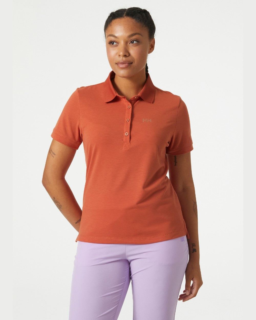 Terracotta coloured Helly Hansen Womens Siren Quick Dry Polo T-shirt on grey background 