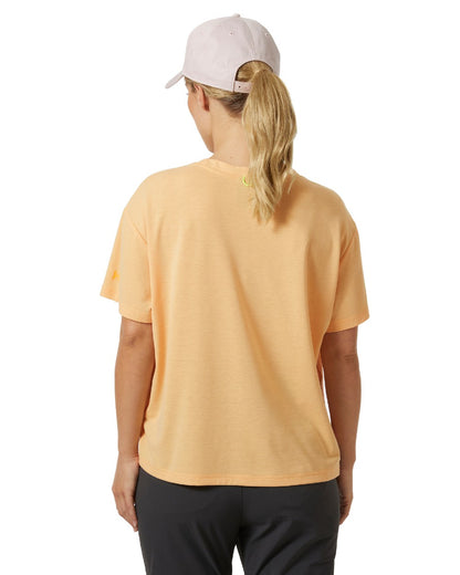 Miami Peach coloured Helly Hansen Womens Siren T-Shirt on white background 