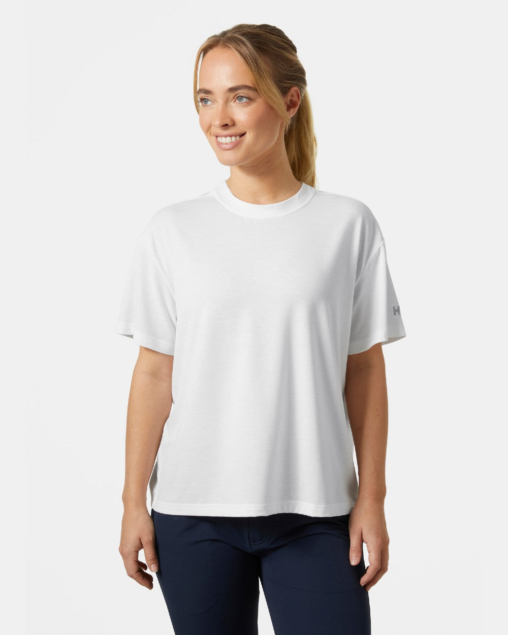 White coloured Helly Hansen Womens Siren T-Shirt on grey background 