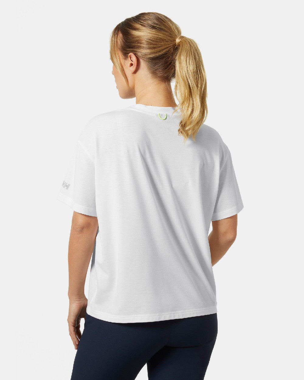 White coloured Helly Hansen Womens Siren T-Shirt on grey background 