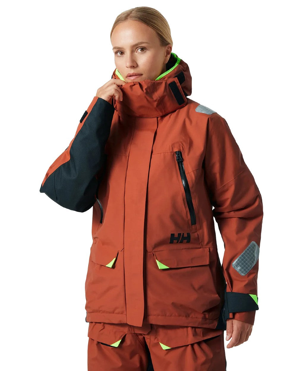 Terracotta coloured Helly Hansen Womens Skagen Offshore Sailing Jacket on white background 