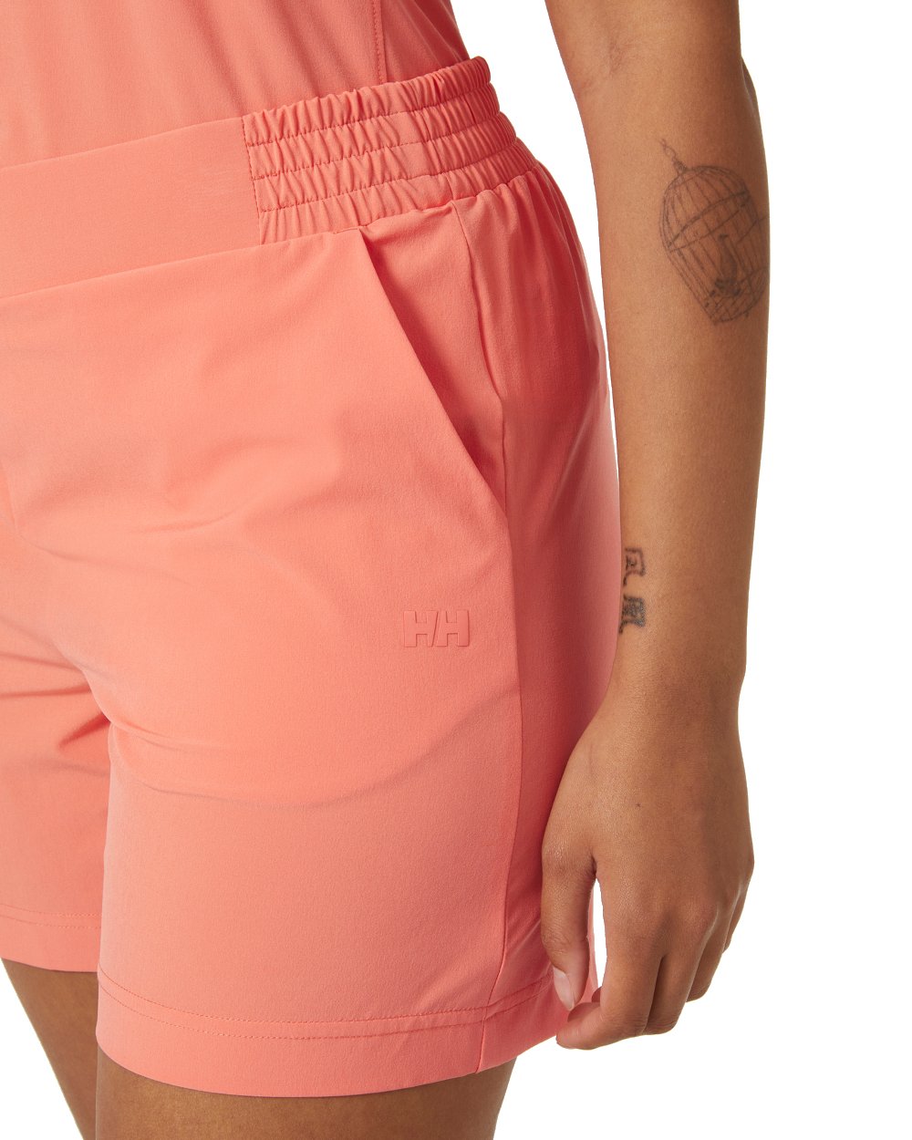 Peach Echo coloured Helly Hansen womens thalia shorts 2.0 on white background 