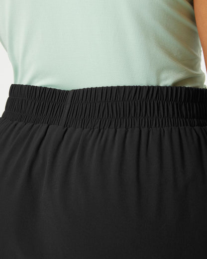 Black coloured Helly Hansen Womens Thalia Skirt 2.0 on grey background 