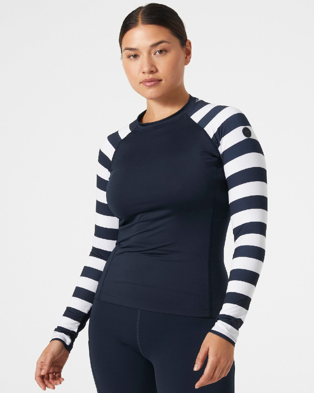 Navy Stripe coloured Helly Hansen Womens Waterwear Rashguard on grey background 