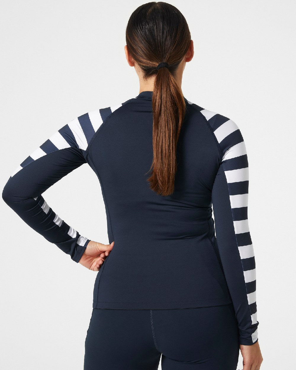 Navy Stripe coloured Helly Hansen Womens Waterwear Rashguard on grey background 