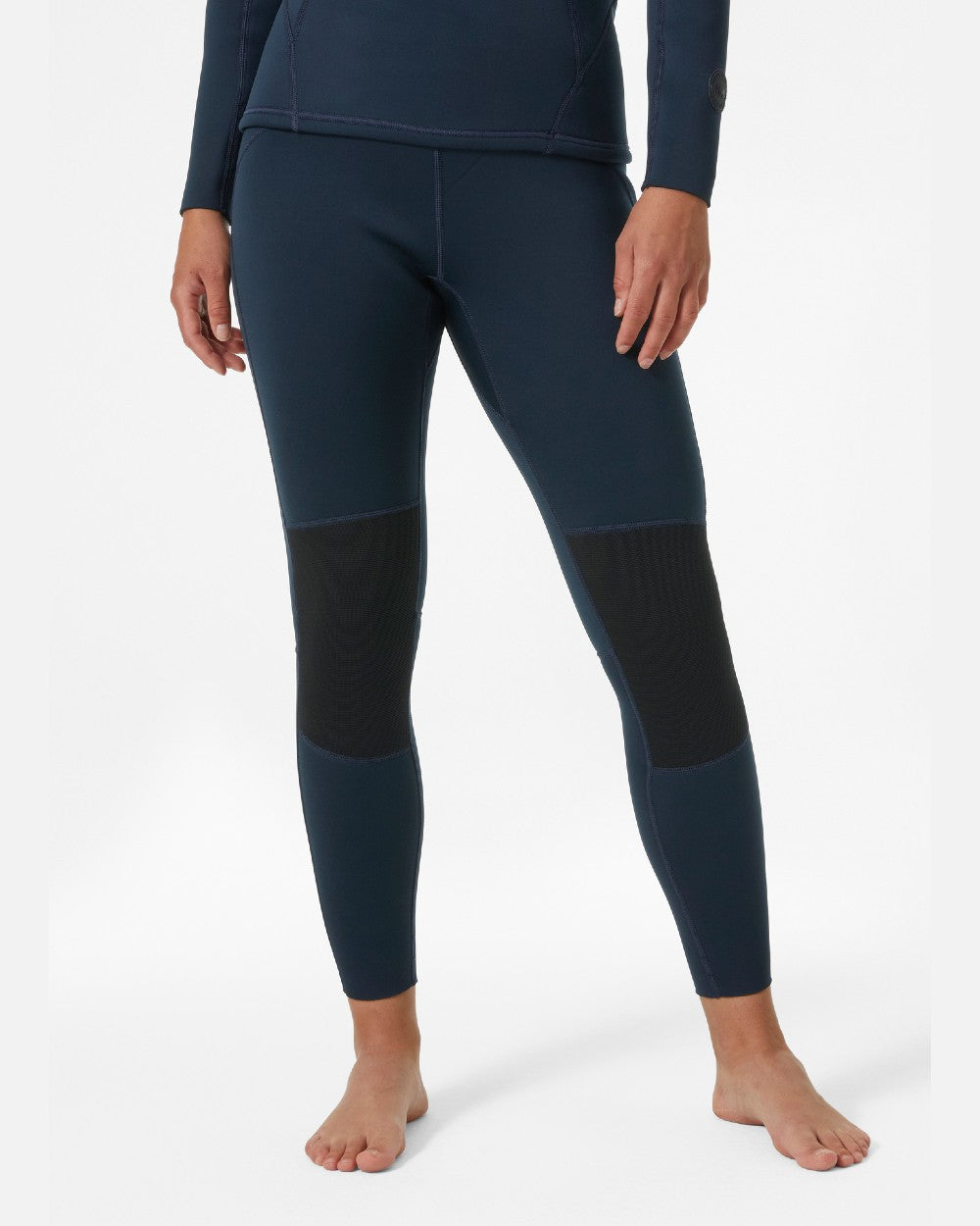 Navy coloured Helly Hansen Womens Waterwear Tights 2.0 on grey background 