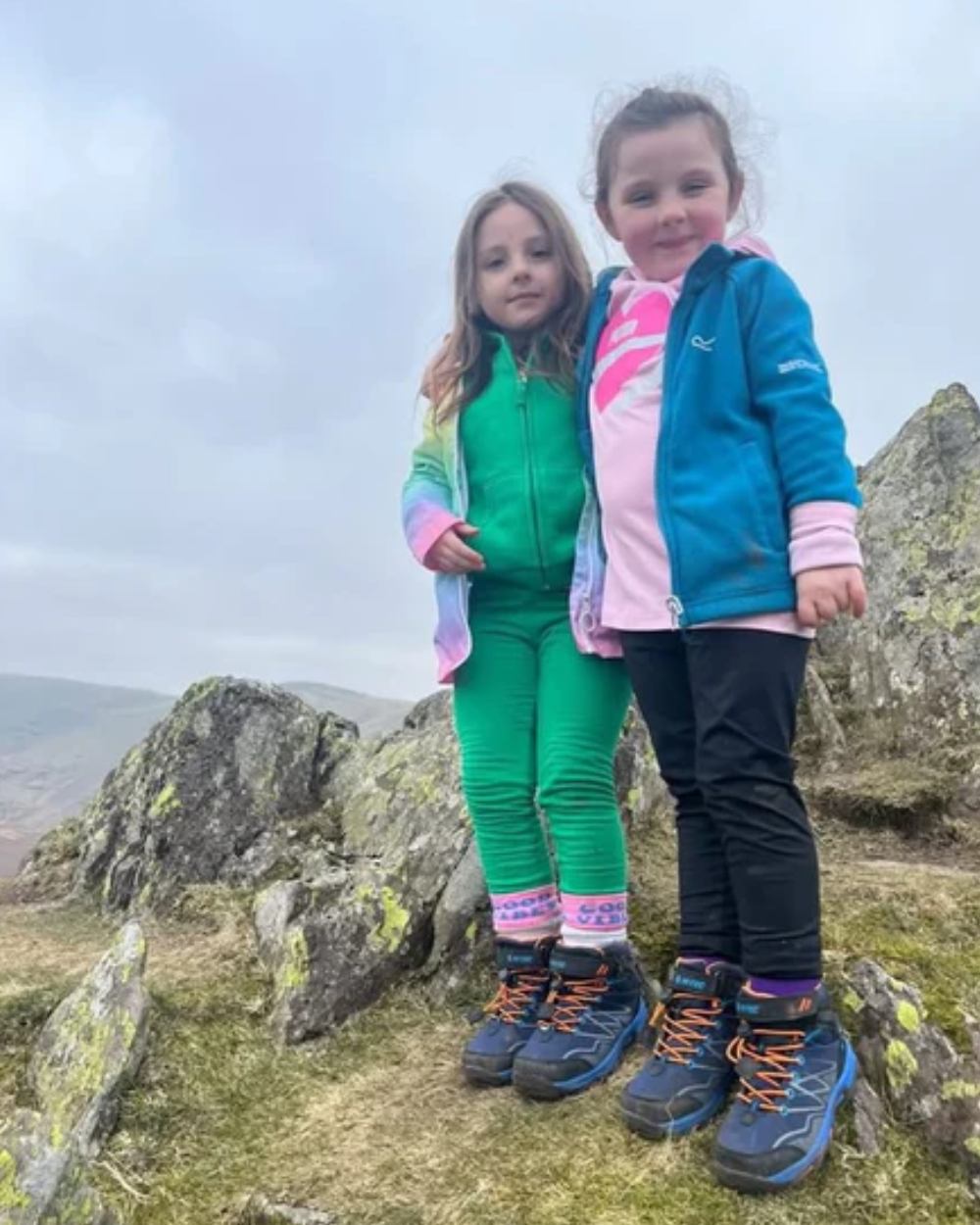 Navy Orange Lake Blue Coloured Hi-Tec Childrens Blackout Mid Boots On A Mountain Background 