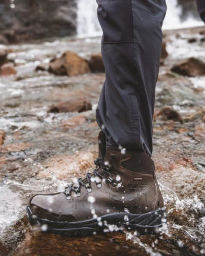 Brown Coloured Hi-Tec Womens Ravine Boots On A Waterfall Background