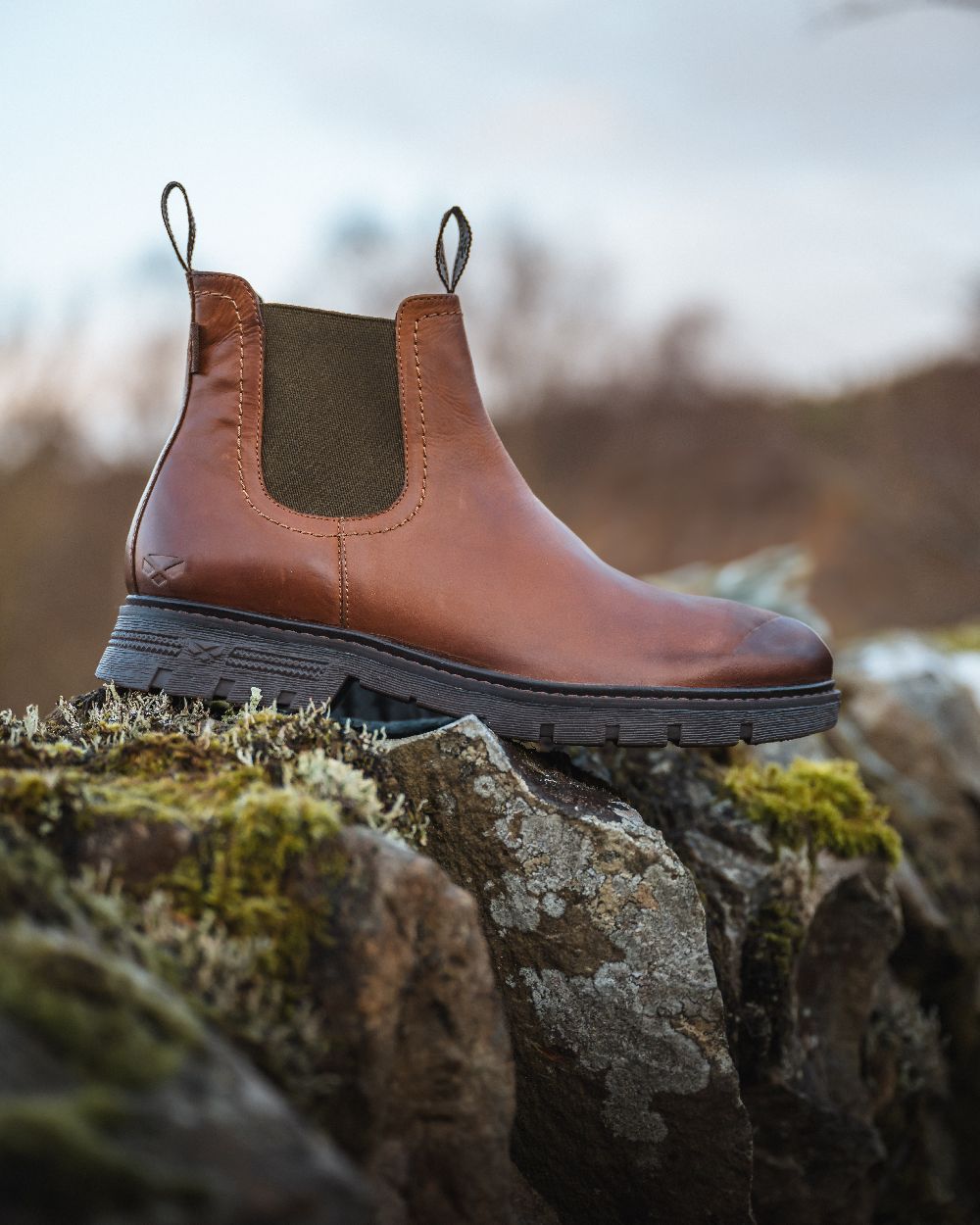 Tan Coloured Hoggs of Fife Dalmeny Dealer Boots On A mountain Background 