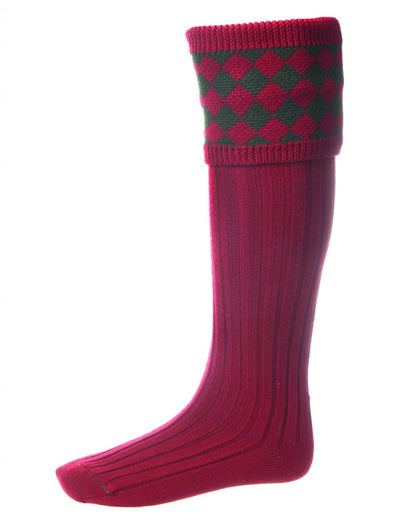 Brick Red Coloured House of Cheviot Chessboard Socks On A White Background 