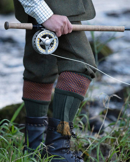 Spruce coloured House of Cheviot Tayside Socks on outdoor background 