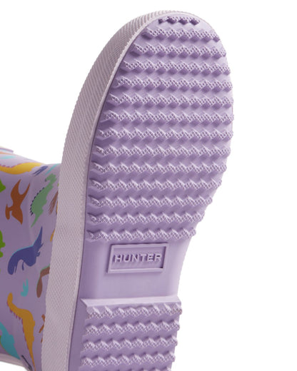 Purple Dinosaur Coloured Hunter Kids First Dinosaur Print Wellington Boots on White Background
