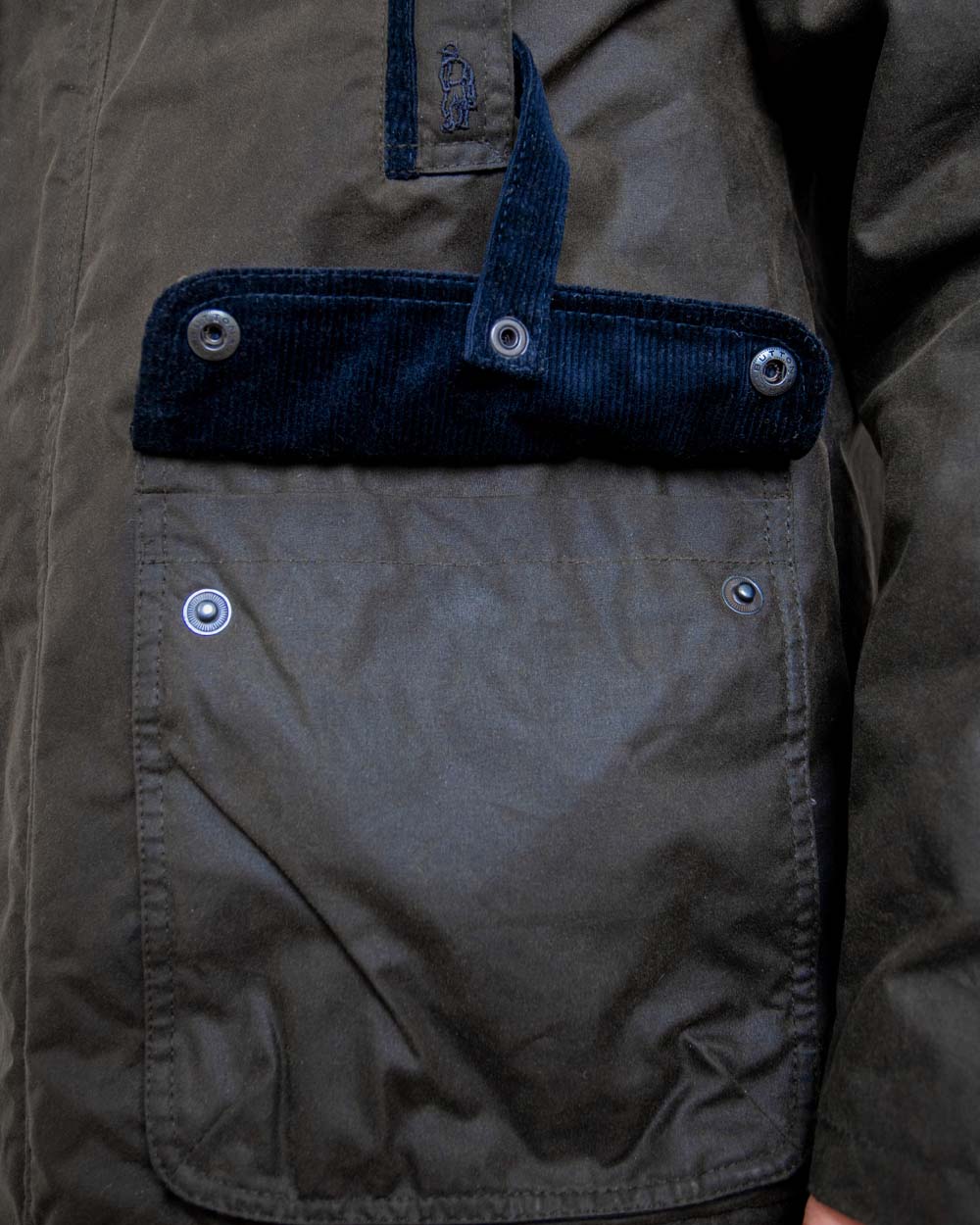 Olive coloured Jack Murphy Archie Wax Jacket Pocket closeup 