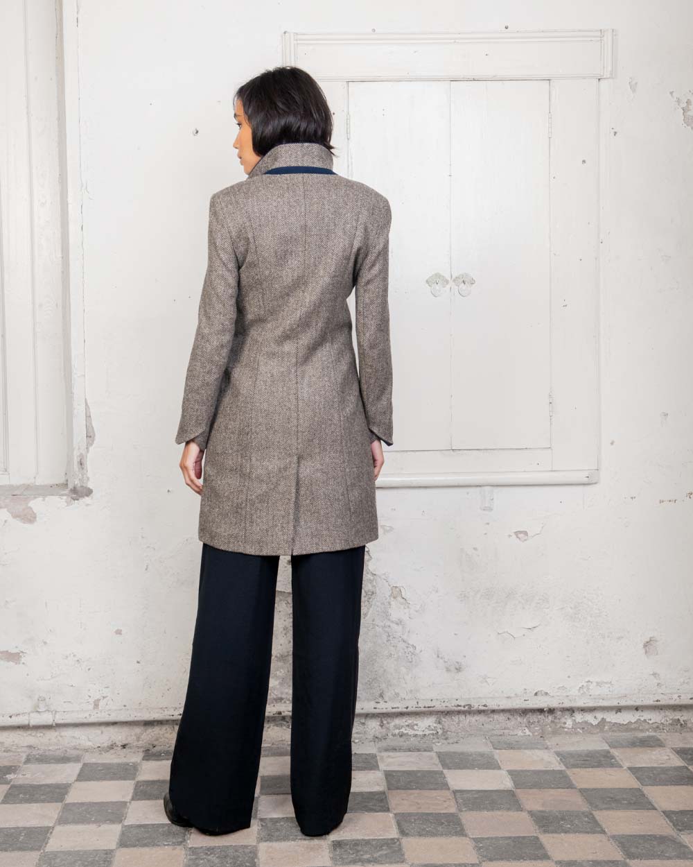 Light Tan Herringbone coloured Jack Murphy Isabella Tweed Coat on Urban background 